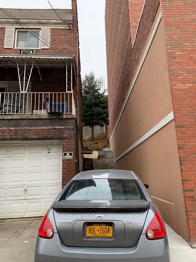 side drive way can park up to two cars - 3484 Fort Independence St