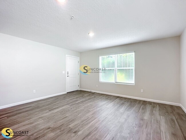 Foto del edificio - 6499 Breezy Oaks Wy