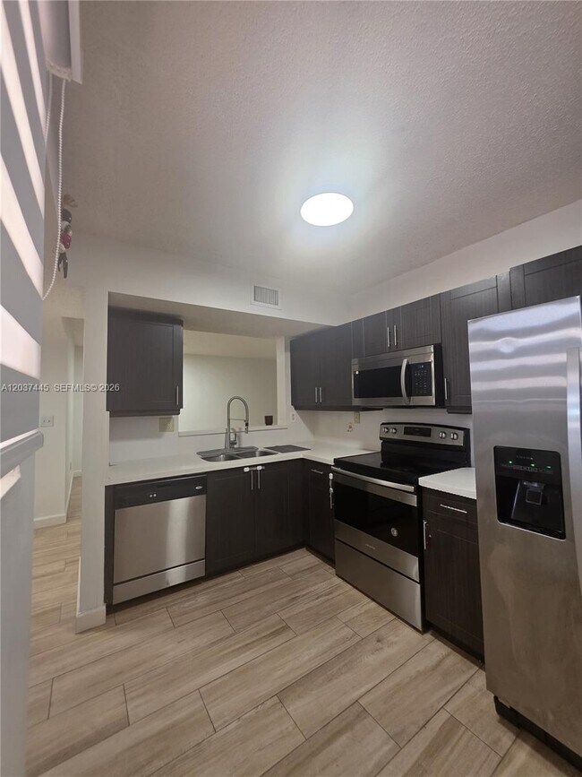 Building Photo - 15711 SW 137th Ave