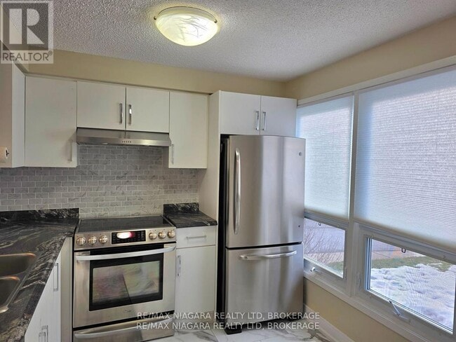 Building Photo - 6767 Thorold Stone Rd