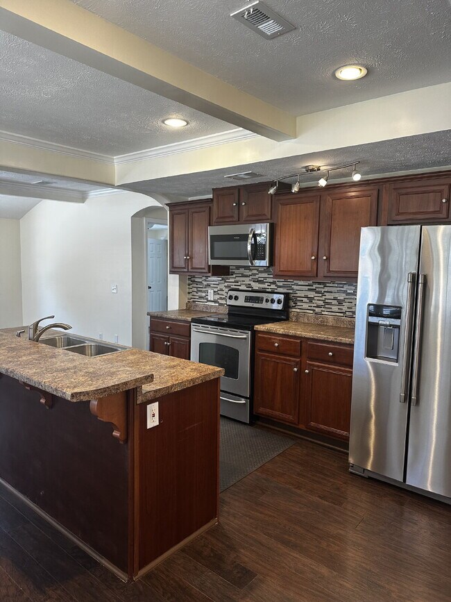 Building Photo - WALK TO ST. ANDREWS MARINA, RESTAURANTS, BARS AND FARMERS MARKET.... you will LOVE this LOCATION!