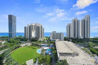 Building Photo - 19370 Collins Ave