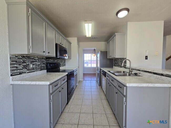 Foto del edificio - 4407 Paintbrush Dr