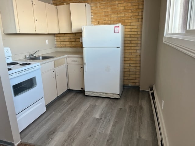 Photo du bâtiment - 1355 12th Av SW