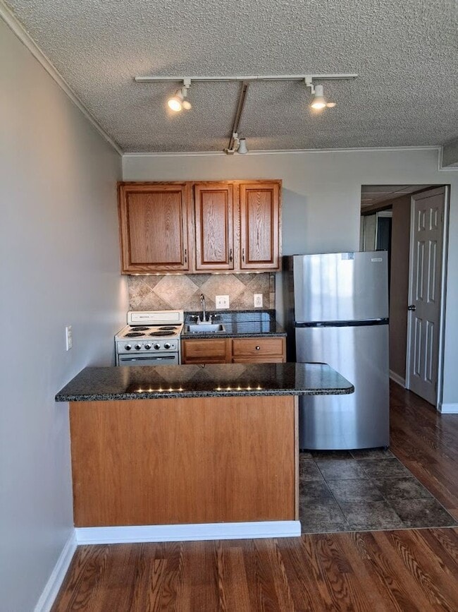 Photo - Fantastic deal on a great location! This studio/1bath is available for EARLY MOVE IN at $1000/month Apartment