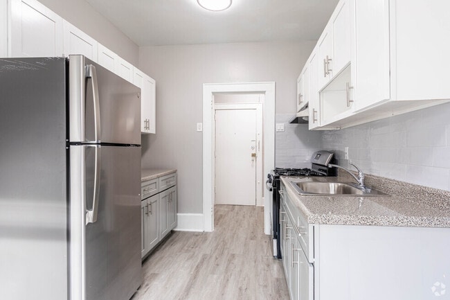 Classic architectural charm complemented by modern updates. - Orange Portfolio Holdings