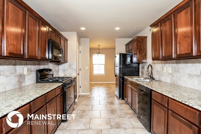 Building Photo - 7412 Comrade Ln