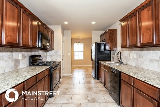 Foto del edificio - 7412 Comrade Ln