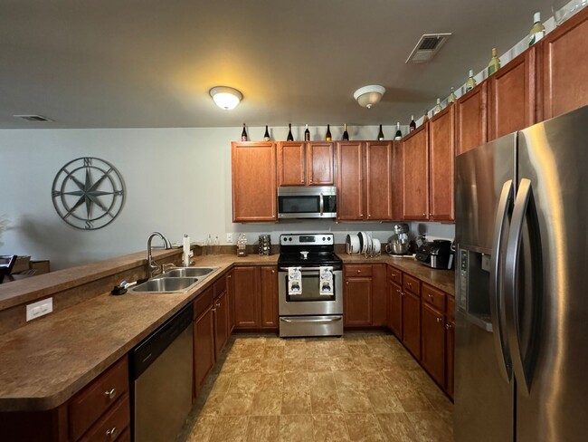 Building Photo - Welcome to this charming Condo ! "ASK ABOU...