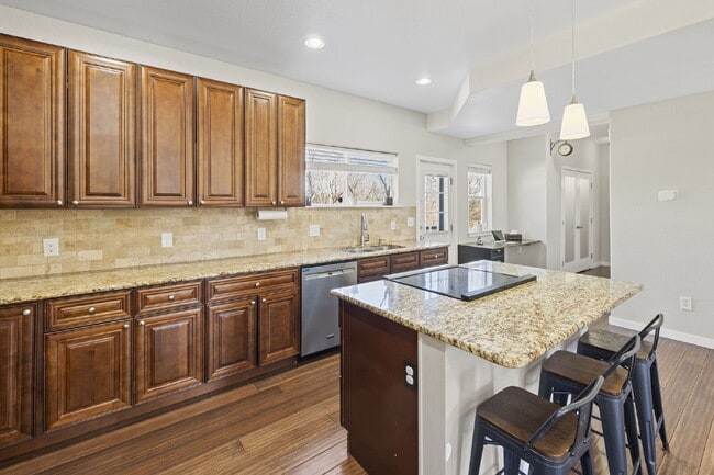 Building Photo - Spacious Home with Finished Basement, Granite Kitchen & Fenced Yard Near Fort Carson