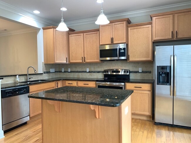 Building Photo - PRIME LOCATION, 3 Bedrooms Suites Apex TH Near HWY, Schools, Shops and Community Amenities!