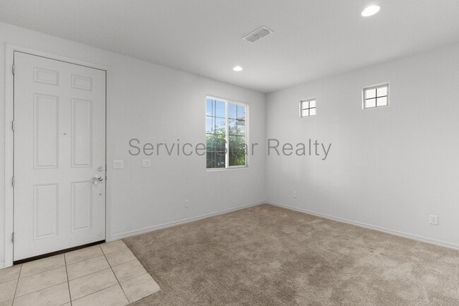 Building Photo - 9031 W San Juan Ave