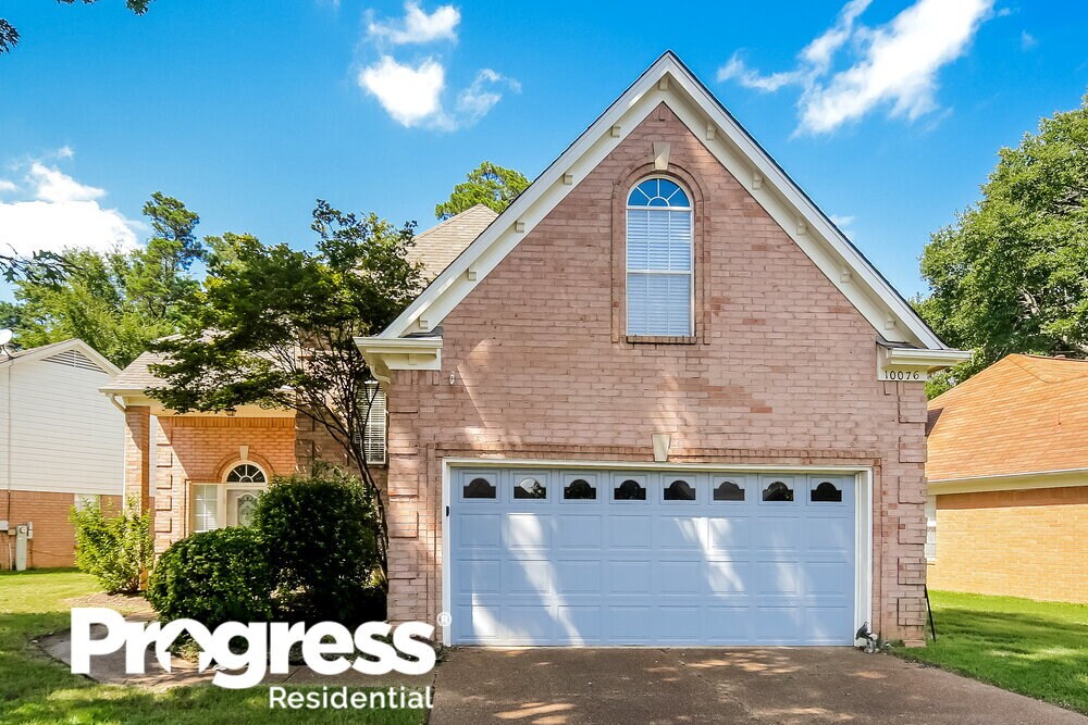 Foto principal - 10076 Woodland Grove Dr