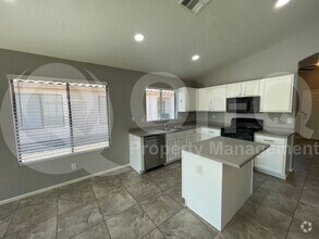 Building Photo - 14867 W Acapulco Ln