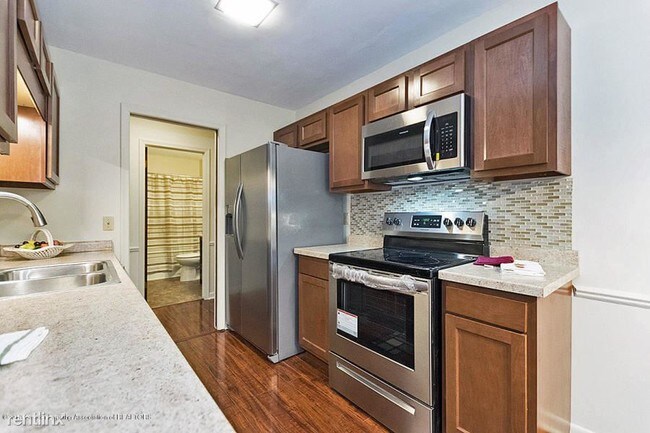 Building Photo - 1 br, 1 bath Condo - 6150 Cobblers Dr Apt 117