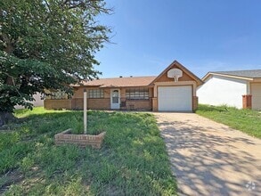 Building Photo - 907 W Coal Ave
