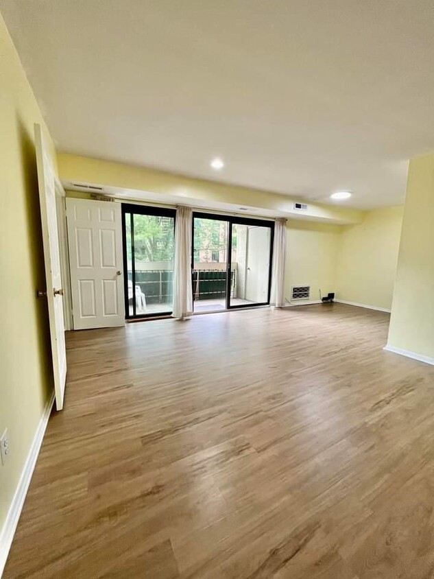 Living room facing balcony - 6147 Leesburg Pike