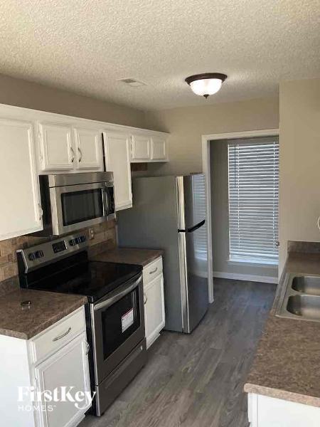 Building Photo - 9006 Whitetail Ct