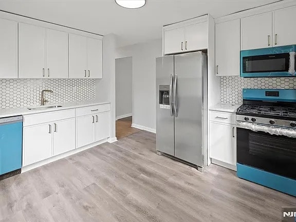 Building Photo - Discover this beautifully updated Cape Cod...