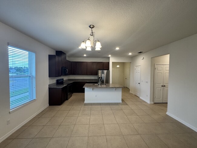 Foto del edificio - 12093 Stone Bark Trail