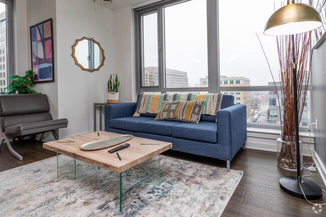 4BR,, 2BA - 1190 SF -Living Room - The Essential