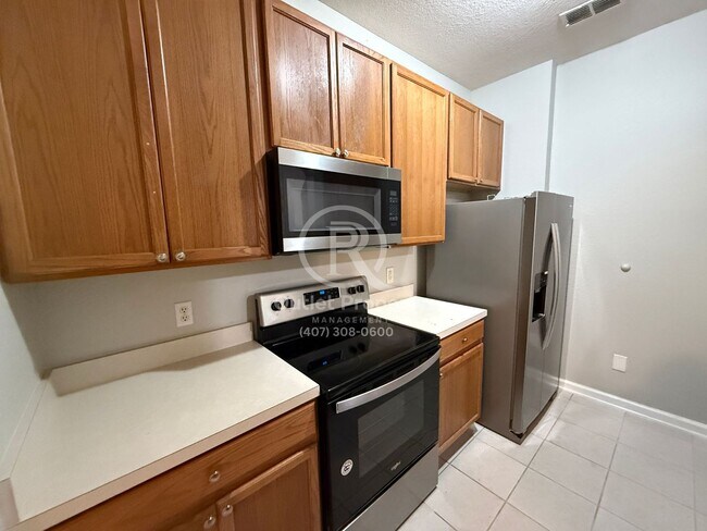 Building Photo - Beautiful Condo 3 Beds / 2 Baths ***Availa...