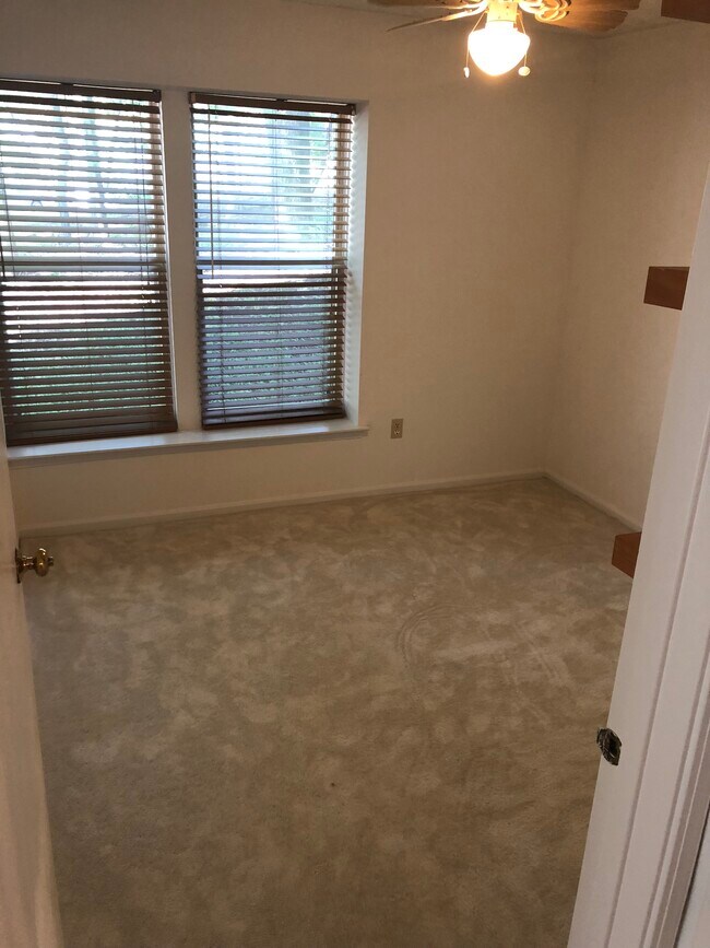 2ND BEDROOM (12 X 9) WITH BUILT IN SHELVES AND WALK IN CLOSET AND CEILING FAN. - 11510 Little Patuxent Pkwy
