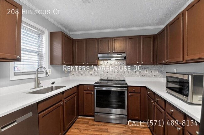 Building Photo - 208 Hibiscus Ct