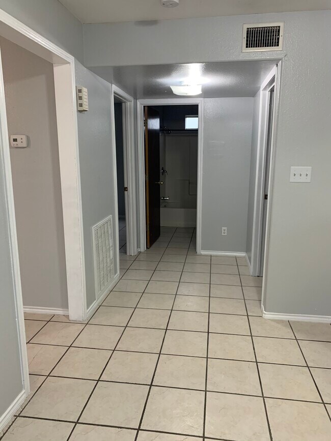 Hall way connecting rooms - 5012 Austin Rd