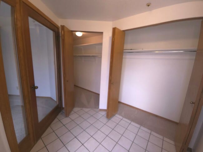 Building Photo - Secured Building with covered parking!