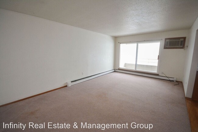 Building Photo - 3 br, 1 bath House - 2011 Viking Dr NW # 30