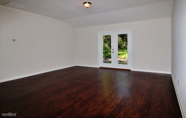 Building Photo - 4 br, 2 bath House - 7024 Paul Howard Dr
