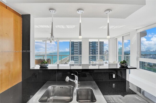 Building Photo - 6365 Collins Ave