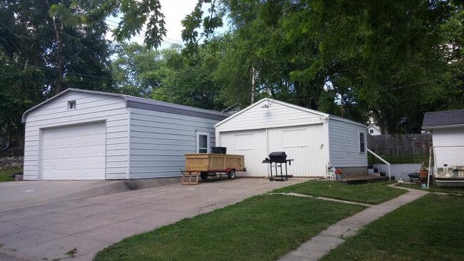 Small garage included with rental property. Larger garage is not. - 2024 Central Ave