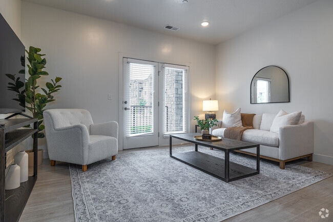 2 habitaciones, 2 baños - 1080 pies cuadrados - Sala de estar - Ridgeline Parkway Apartments