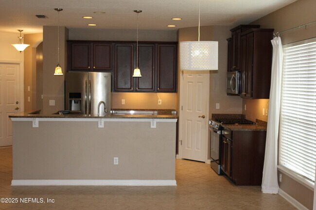 Building Photo - 5955 Wind Cave Ln