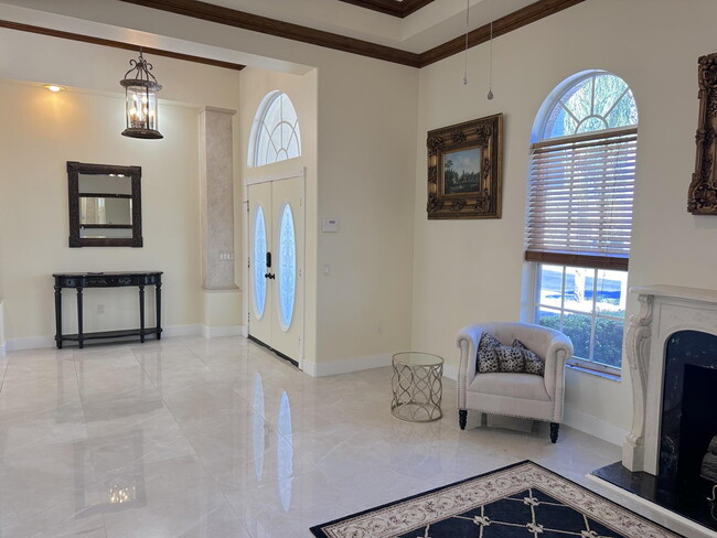 Building Photo - Stunning 5-Bedroom Pool Home in Gated Spyg...