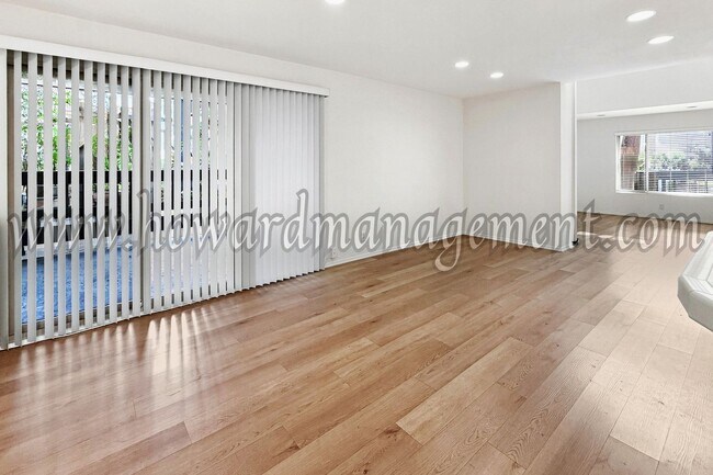 Building Photo - LAKE VIEW in LA! Majestic townhouse with high ceilings, three patios and lake view!