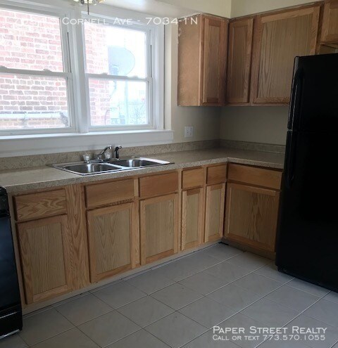 Building Photo - 7034 S Cornell Ave