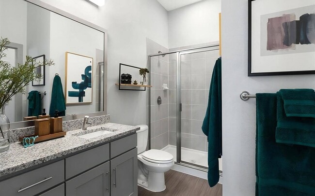 Bathroom with Walk-In Shower, Quartz Countertop Vanity, and Wall-Mounted Shelf - Rhythm