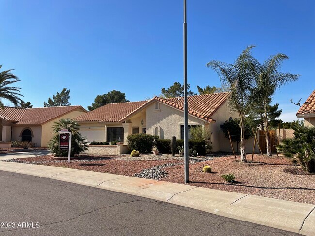 Building Photo - 9724 W Escuda Dr