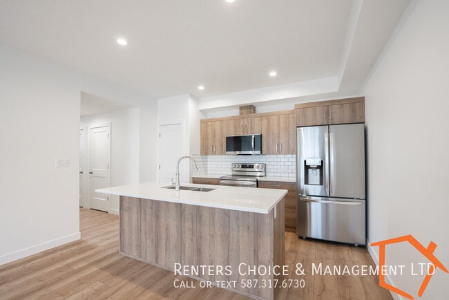 Building Photo - NEW 2 BEDROOM MAIN FLOOR UNIT WITH ASSIGNE...