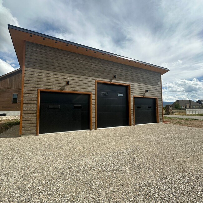 Building Photo - 2 bedroom home with 3 car detached garage