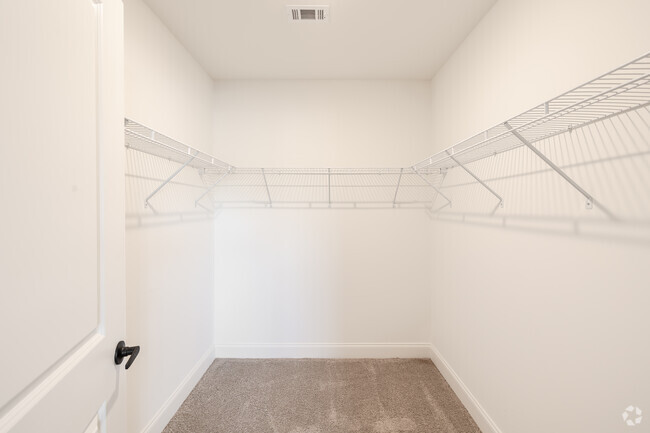 1BR, 1BA - 1,172SF - Primary Bedroom Closet - The Retreat at Stuart Crossing