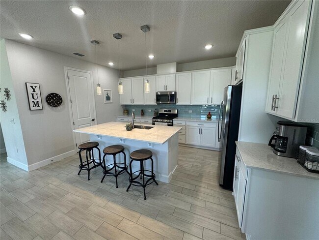 Building Photo - 5058 Meadow Song Dr