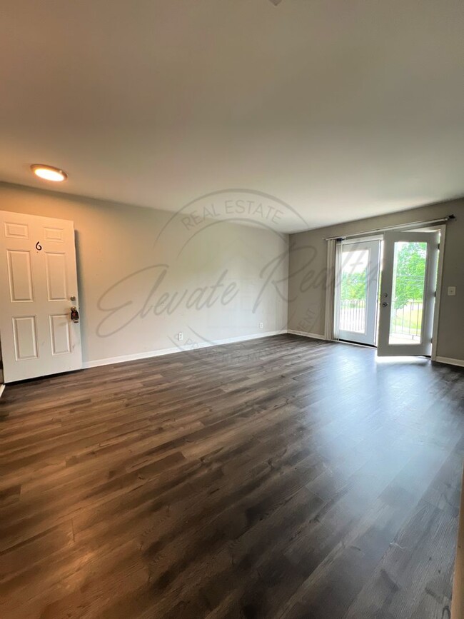 Building Photo - One Bedroom Condo, FIRST FLOOR, Assigned P...