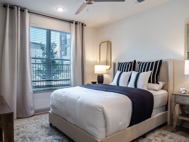 The Sabine: 2BR, 2BA- Primary Bedroom - The Flats at Ransley