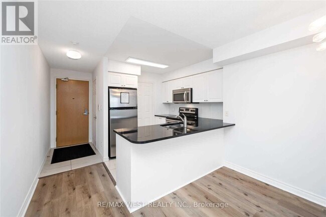 Photo du bâtiment - 88-2688 Grangeway Ave