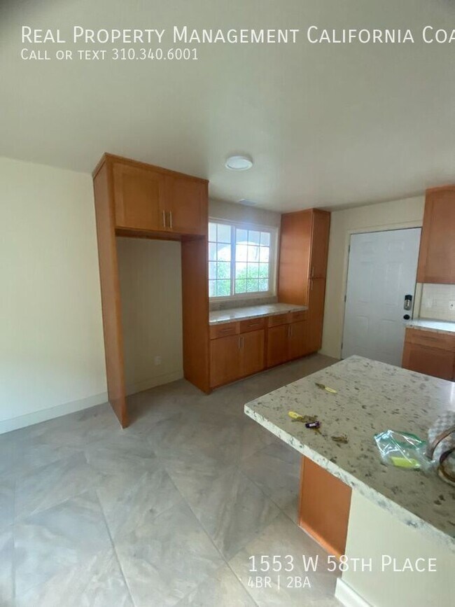 Foto del edificio - 1553 W 58th Pl