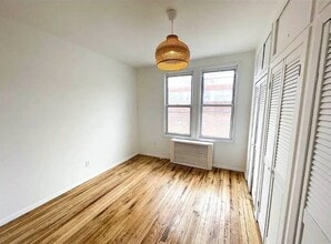 Building Photo - 72-43 60th Ln